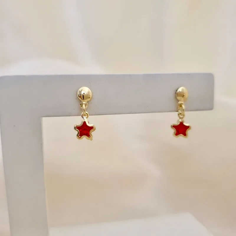 Brinco pingente estrela zirconia vermelha